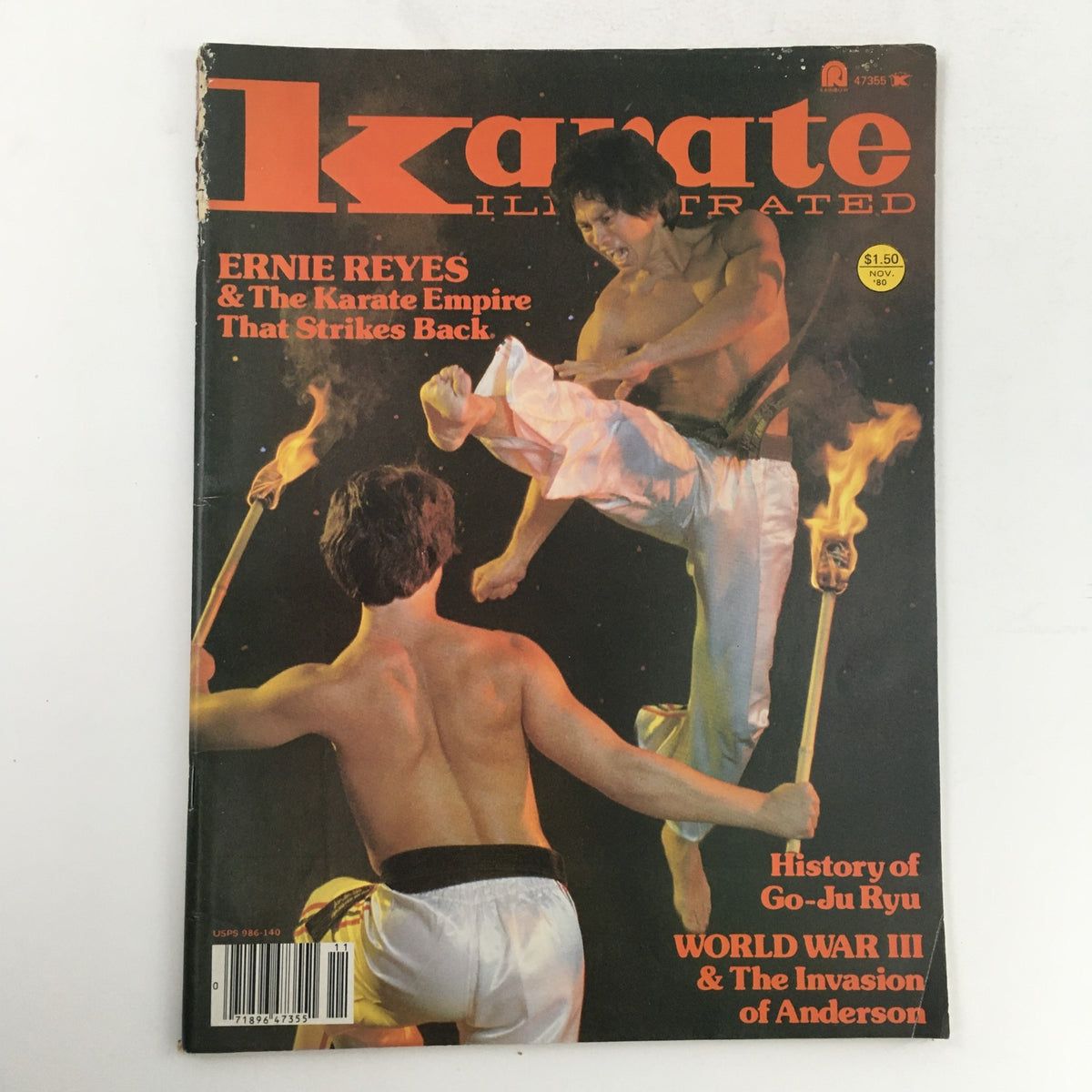 Cover of Karate Illustrated Magazine November 1980 Vol 11 #11 featuring Ernie Reyes Jr. performing a dynamic karate kick, with a background of flames and a fellow martial artist holding a torch. Highlights discussions on 'The Karate Empire' and includes features on Go-Ju Ryu.