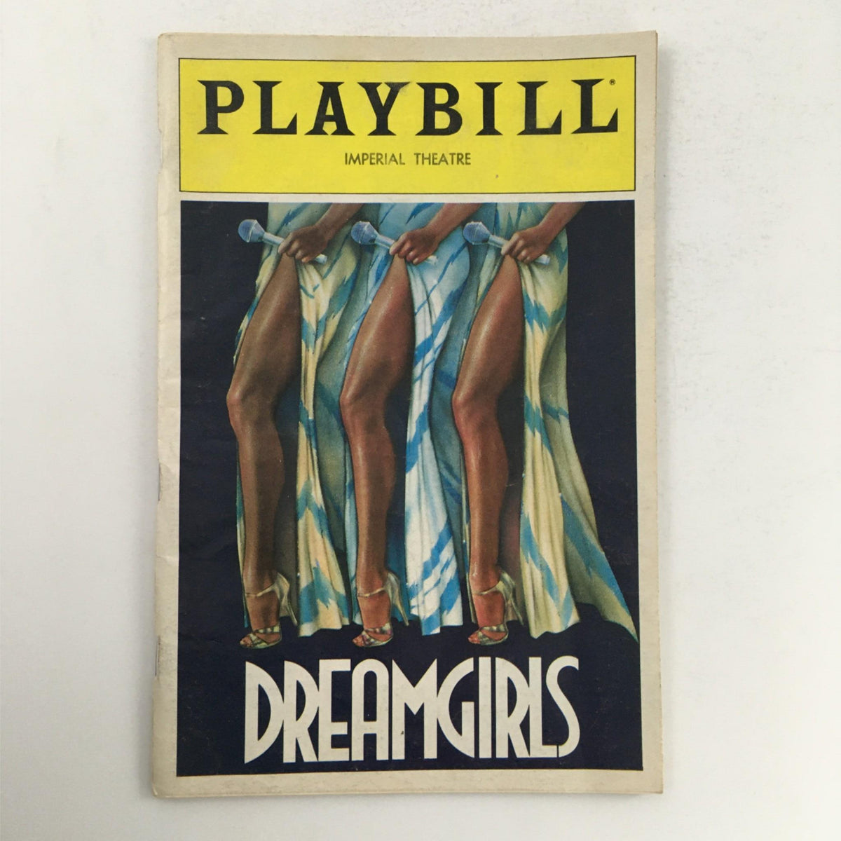 1982 Playbill for Dreamgirls by Michael Bennett and Michael Peters, showcasing the iconic cover featuring the legs of performers in flowing dresses, at the Imperial Theatre.