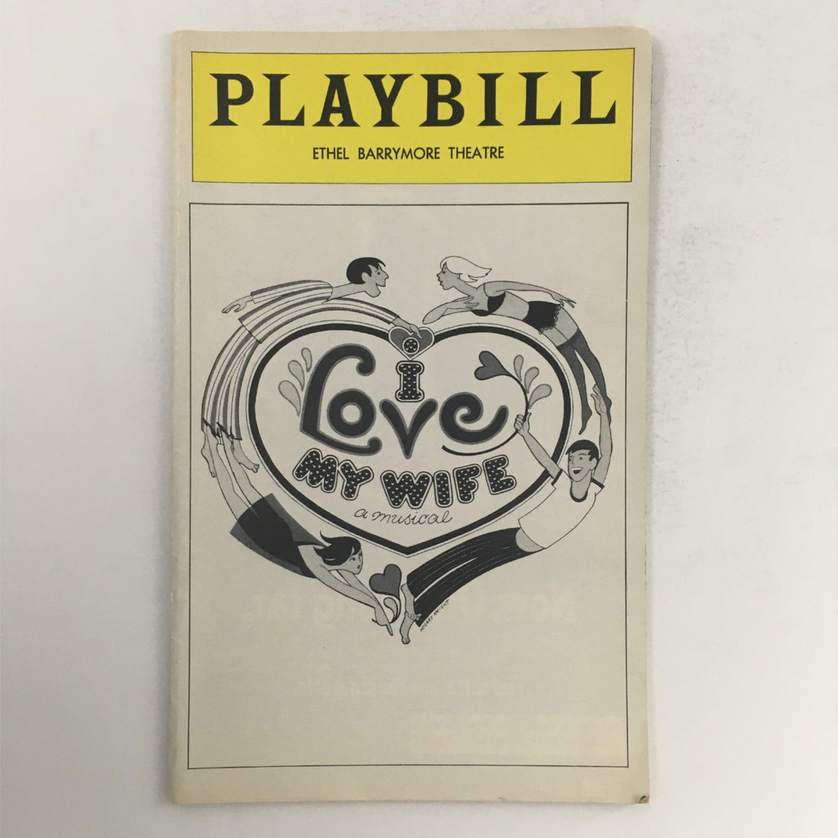 1977 Playbill for 'I Love My Wife' at Ethel Barrymore Theatre, featuring a heart design and illustrations of performers, showcasing the charm of Broadway.