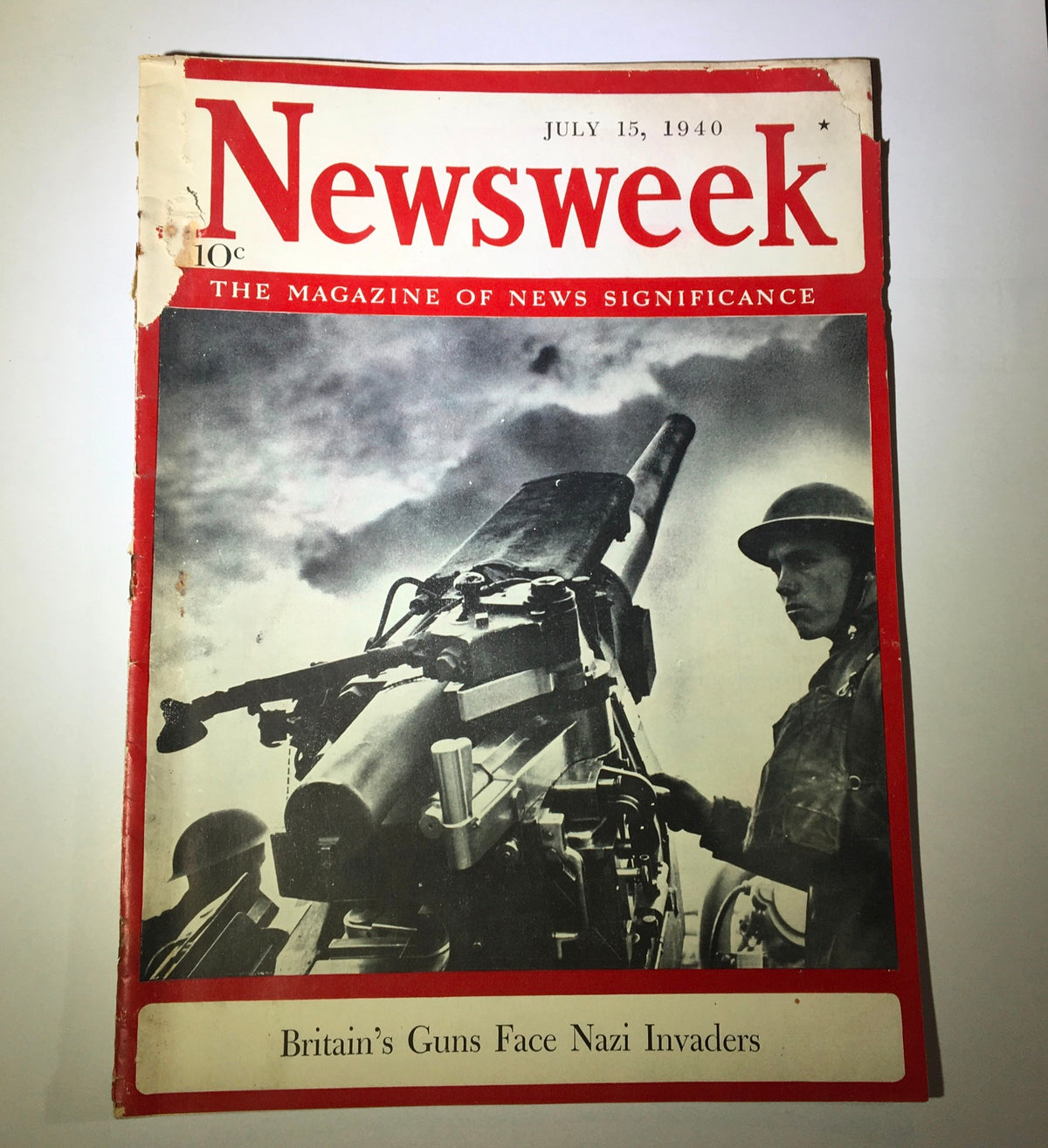 Close-up view of the cover of Newsweek Magazine from July 15, 1940, highlighting the title 'Britain's Guns Face Nazi Invaders'.