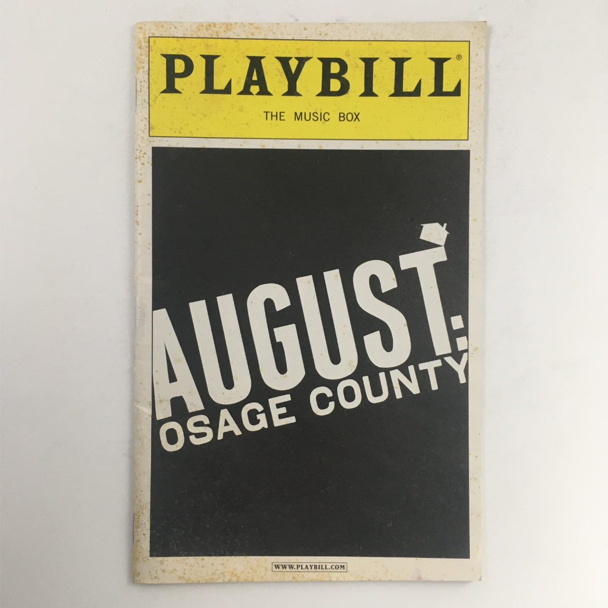 2008 Playbill for August: Osage County at The Music Box Theatre showcasing the title in bold white letters on a black background, representing a significant theatrical production by Tracy Letts, directed by Anna Shapiro.