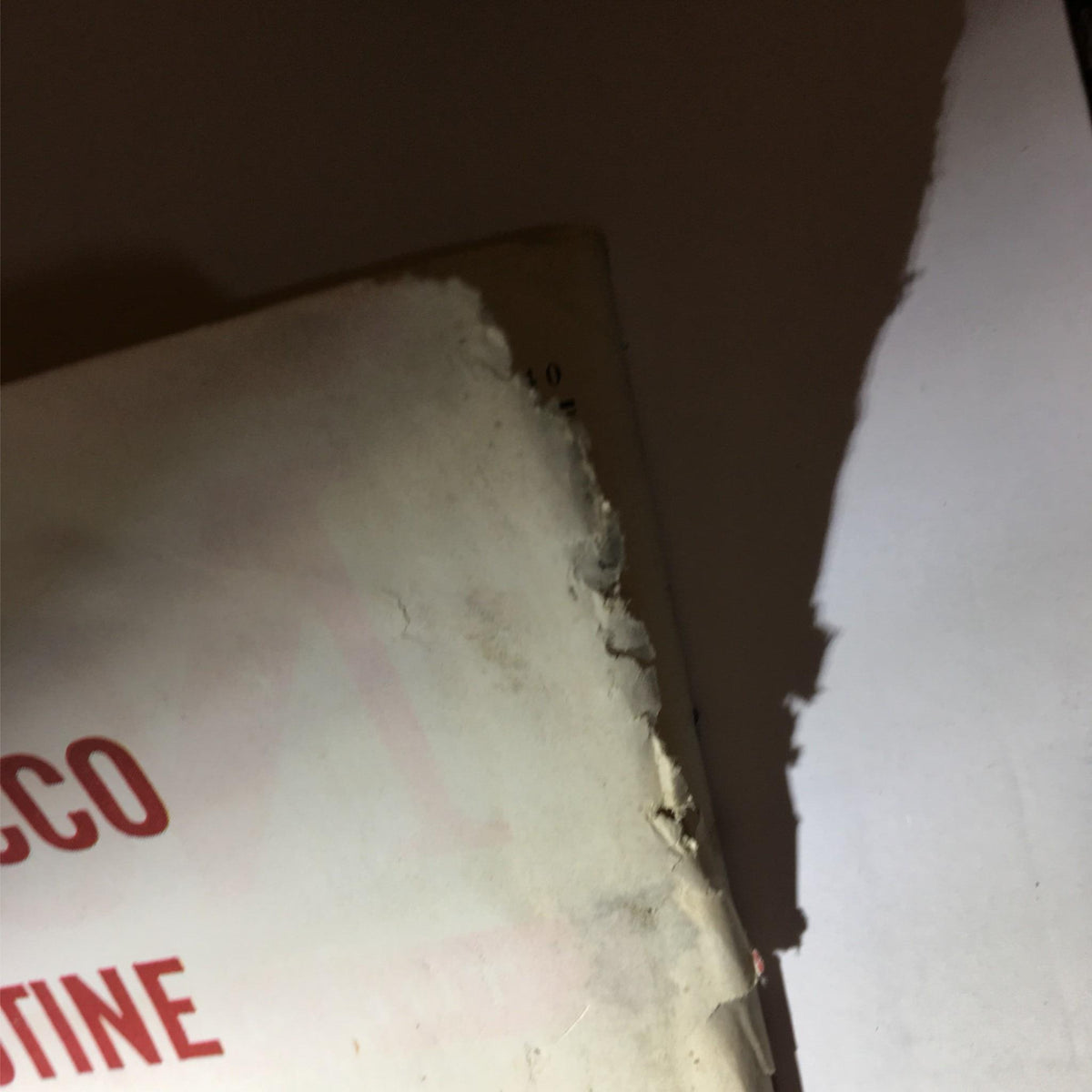 Damaged corner of the back cover of Newsweek Magazine July 15, 1940, highlighting age-related wear and markings.