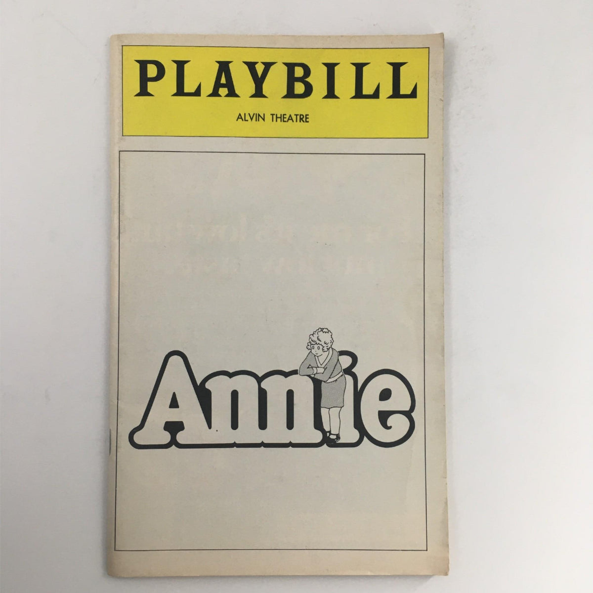 1978 Playbill for Annie at Alvin Theatre, featuring the iconic yellow cover and illustration of Annie, showcasing its vintage Broadway charm.