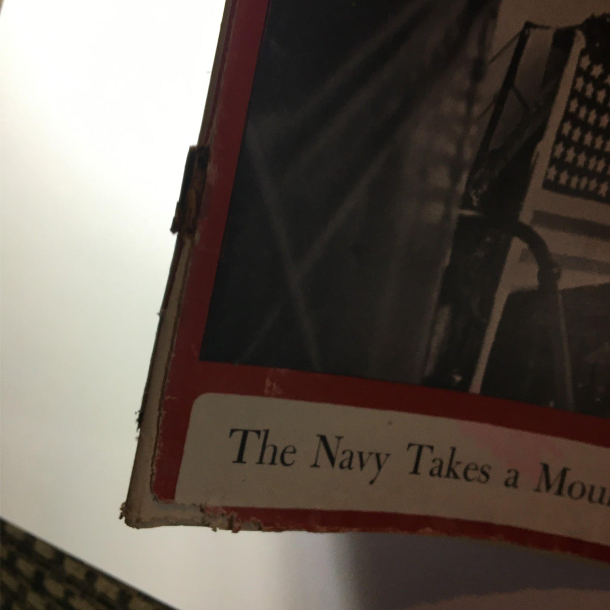 Close-up of Newsweek Magazine January 26, 1942, highlighting the title 'The Navy Takes a Mounting Toll in the Pacific' and showing signs of age and wear.