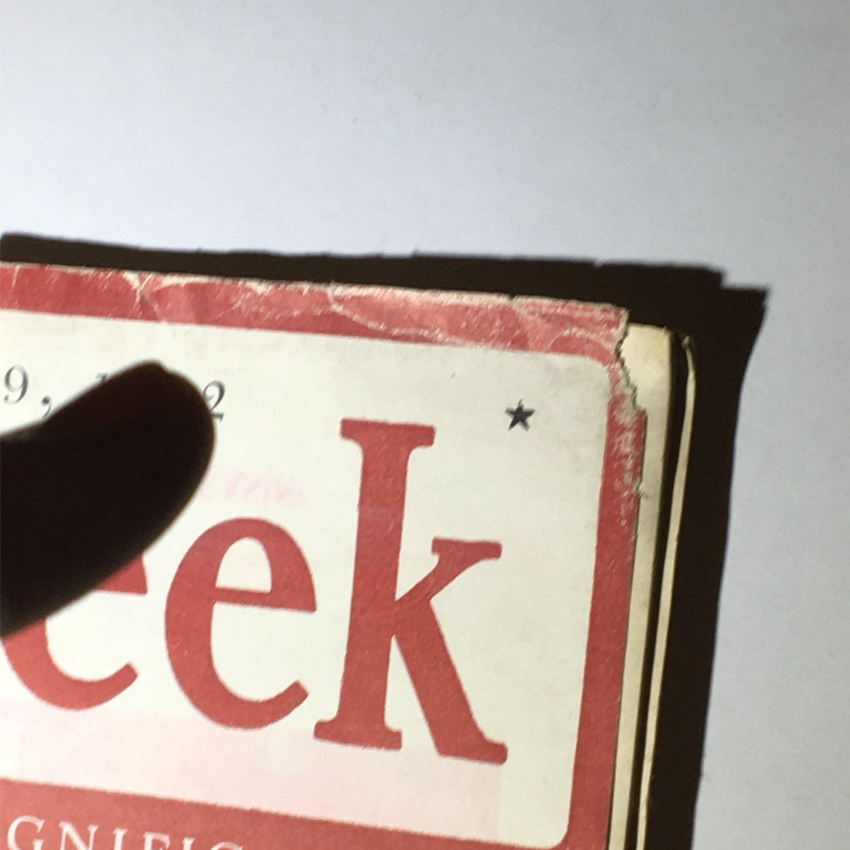 Detailed view of the title section of Newsweek Magazine February 9, 1942, emphasizing the magazine's name and issue date, part of World War II memorabilia.