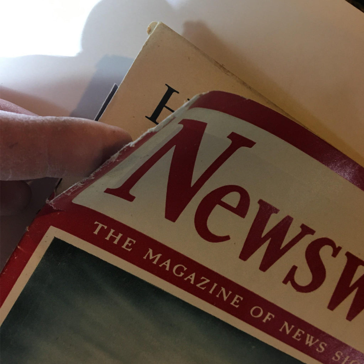 Close-up of the Newsweek Magazine from July 27, 1942, showing the title and date, emphasizing its vintage condition.