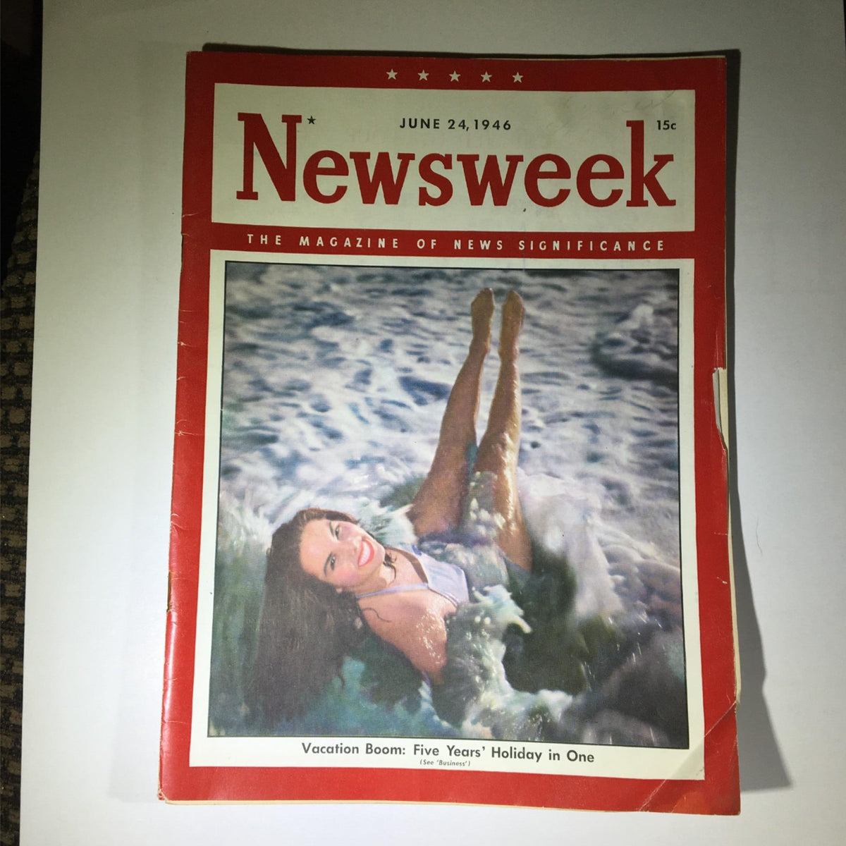 Cover of Newsweek Magazine from June 24, 1946 featuring the title 'Vacation Boom: Five Years' Holiday In One' with a woman enjoying the waves.
