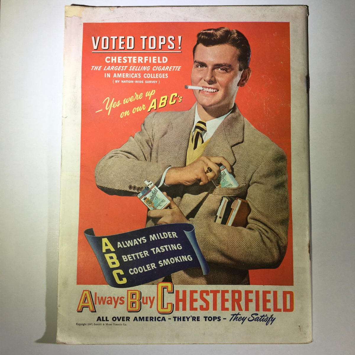 Back cover of the Newsweek Magazine from March 31, 1947, displaying a vintage Chesterfield cigarette advertisement, relevant to the era's marketing aesthetics.