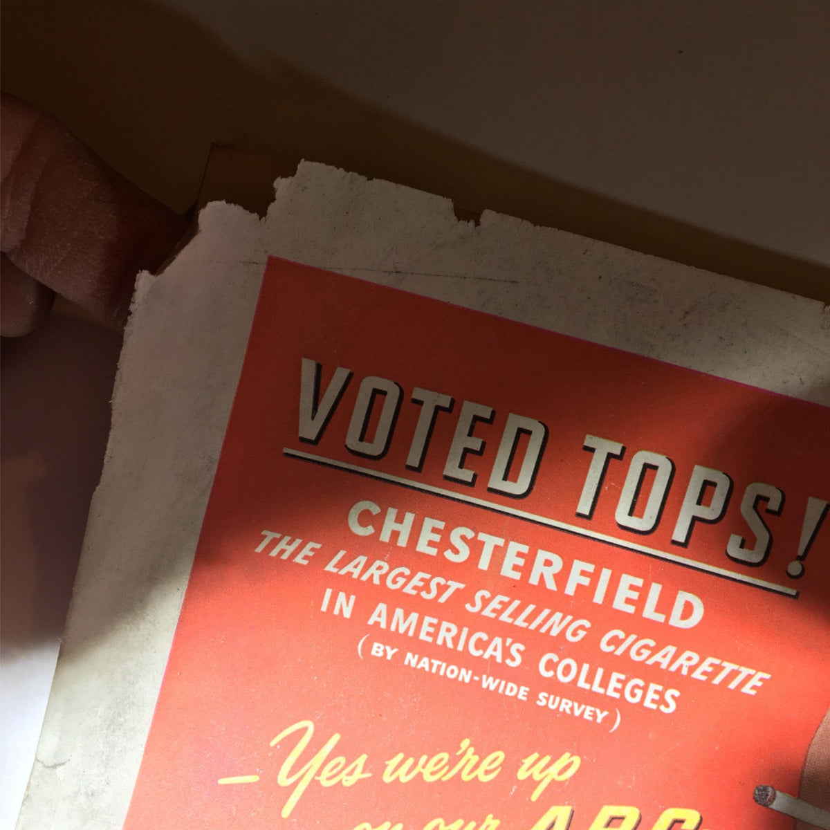Close-up of the Chesterfield cigarette advertisement on the back cover of the Newsweek Magazine dated March 31, 1947, emphasizing its historical advertising style.