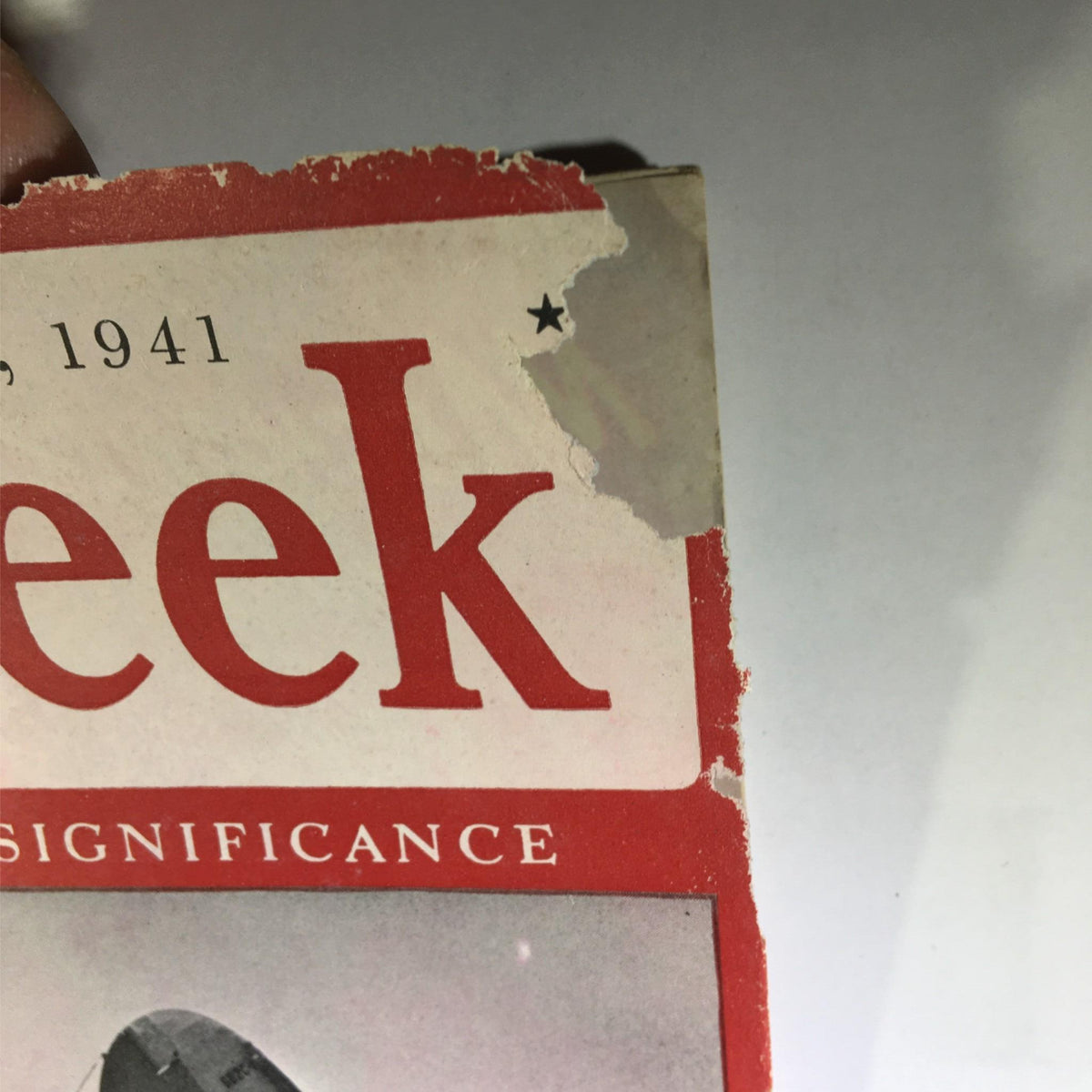Another close-up image capturing the worn edges of Newsweek Magazine dated December 22, 1941, emphasizing the historical significance of the title.