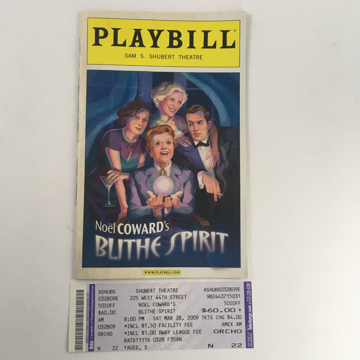 2009 Playbill for Blithe Spirit by Noel Coward featuring a colorful cover illustration, along with tickets showing the performance details at Sam S. Shubert Theatre.