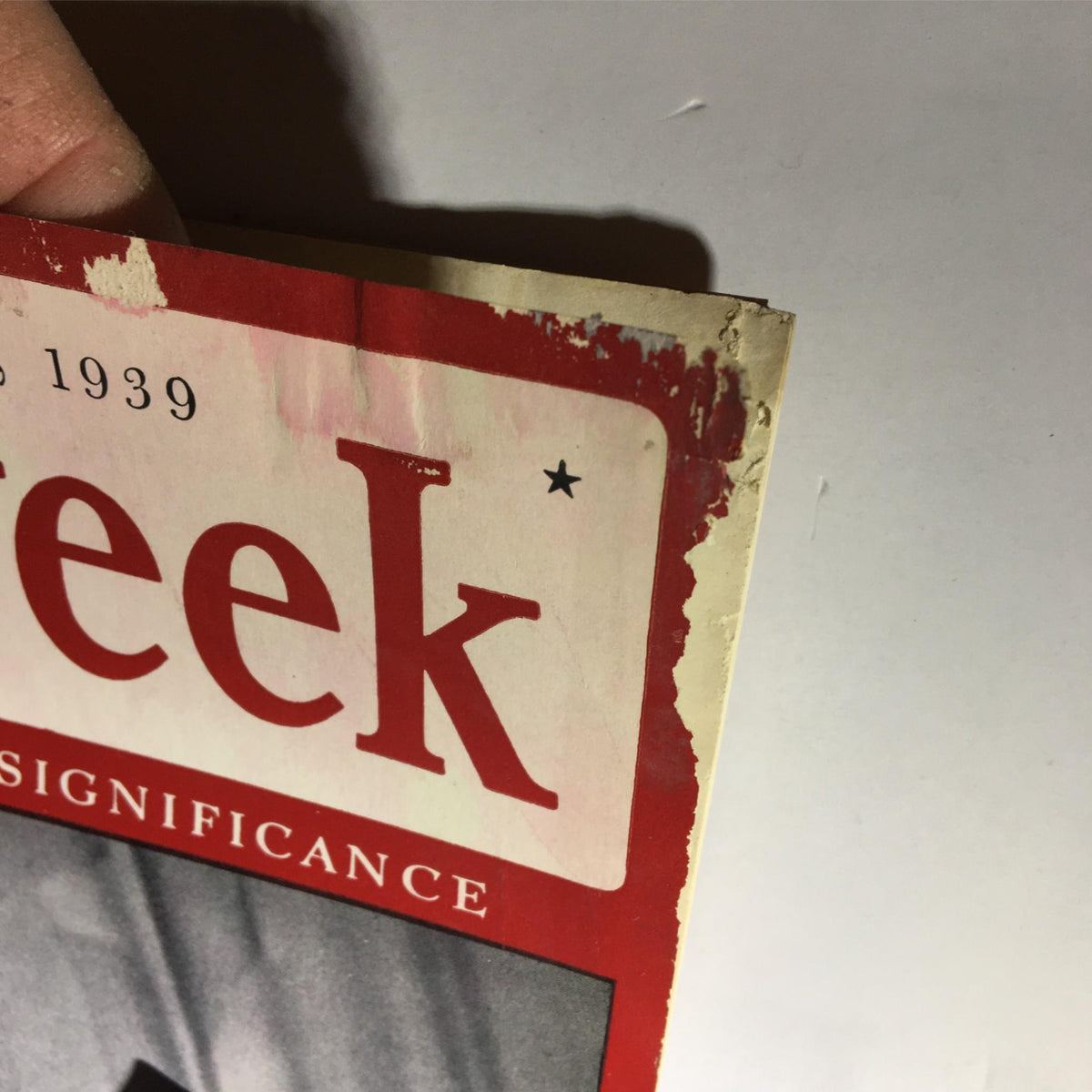 Close-up view of the top edge of Newsweek Magazine from August 14, 1939, showing wear and tear on the cover.