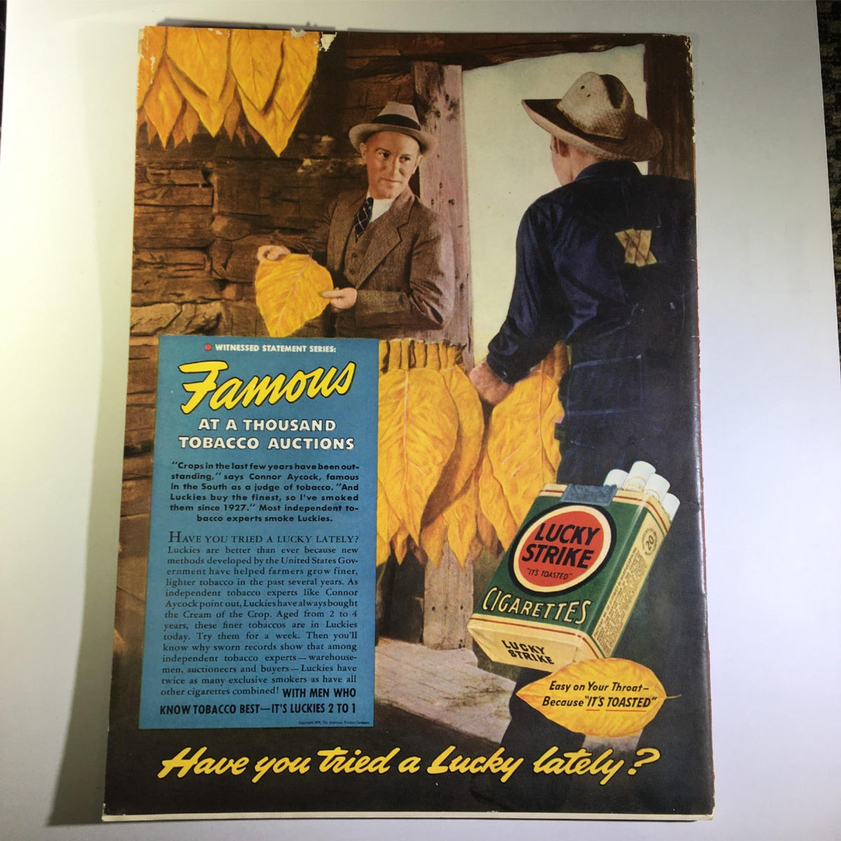 Newsweek Magazine August 14, 1939 cover featuring a historical advertisement for Lucky Strike cigarettes, showcasing yellow tobacco leaves and a scene from a tobacco auction.