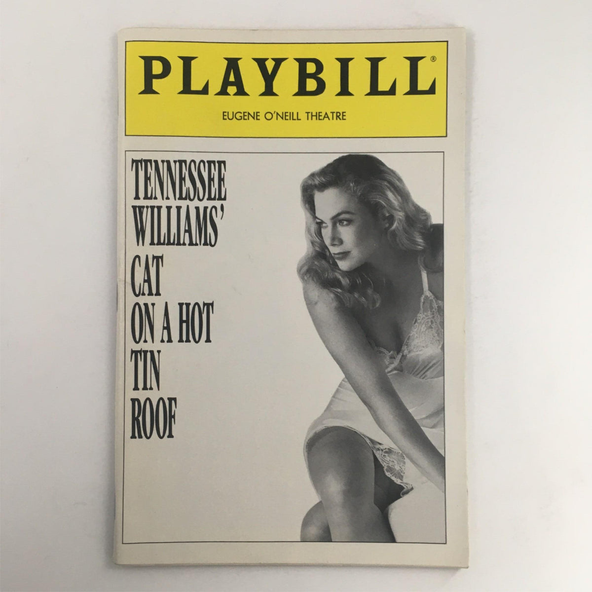 1990 Playbill for Tennessee Williams' Cat On A Hot Tin Roof featuring a black and white image of a woman on the cover, showcasing the Eugene O’Neill Theatre.