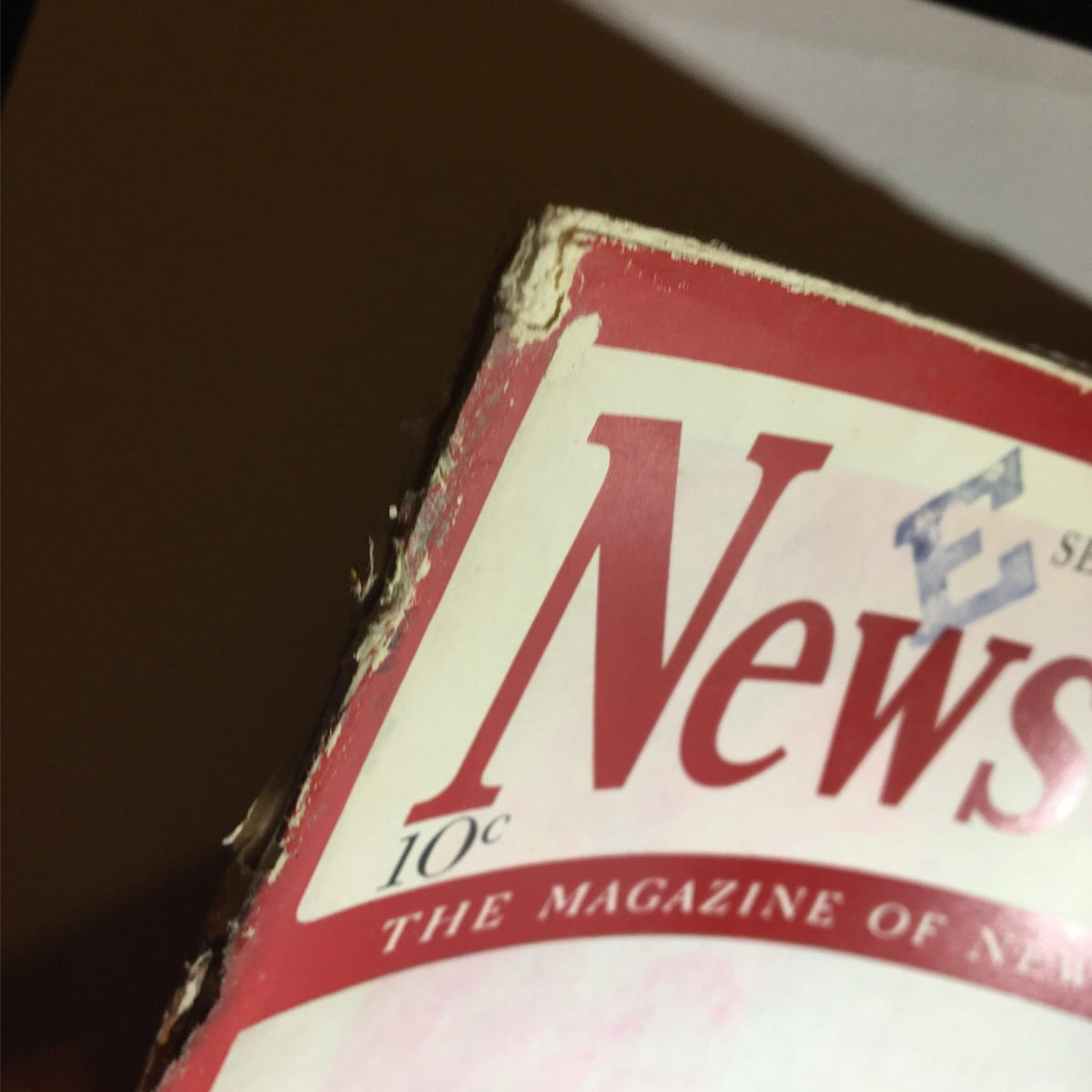 Close-up of the top edge of Newsweek Magazine from September 11, 1939, revealing wear and tear typical of vintage magazines, highlighting its authenticity.