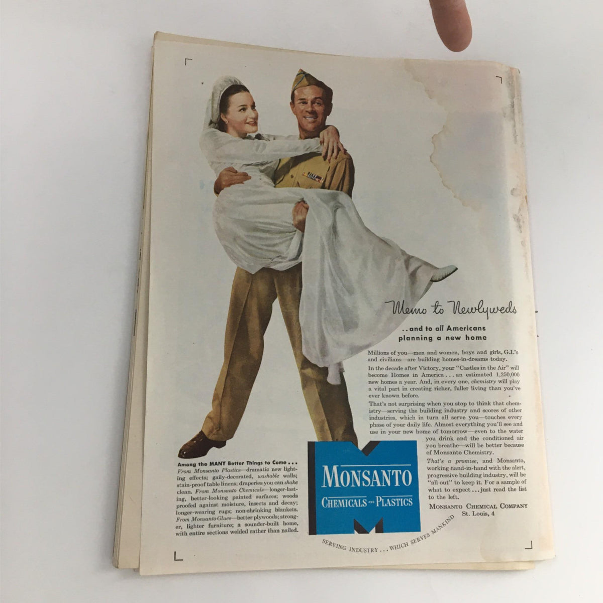 Cover page of Newsweek Magazine August 13, 1945 showcasing a newlywed couple, highlighting themes of home and family in post-war America.