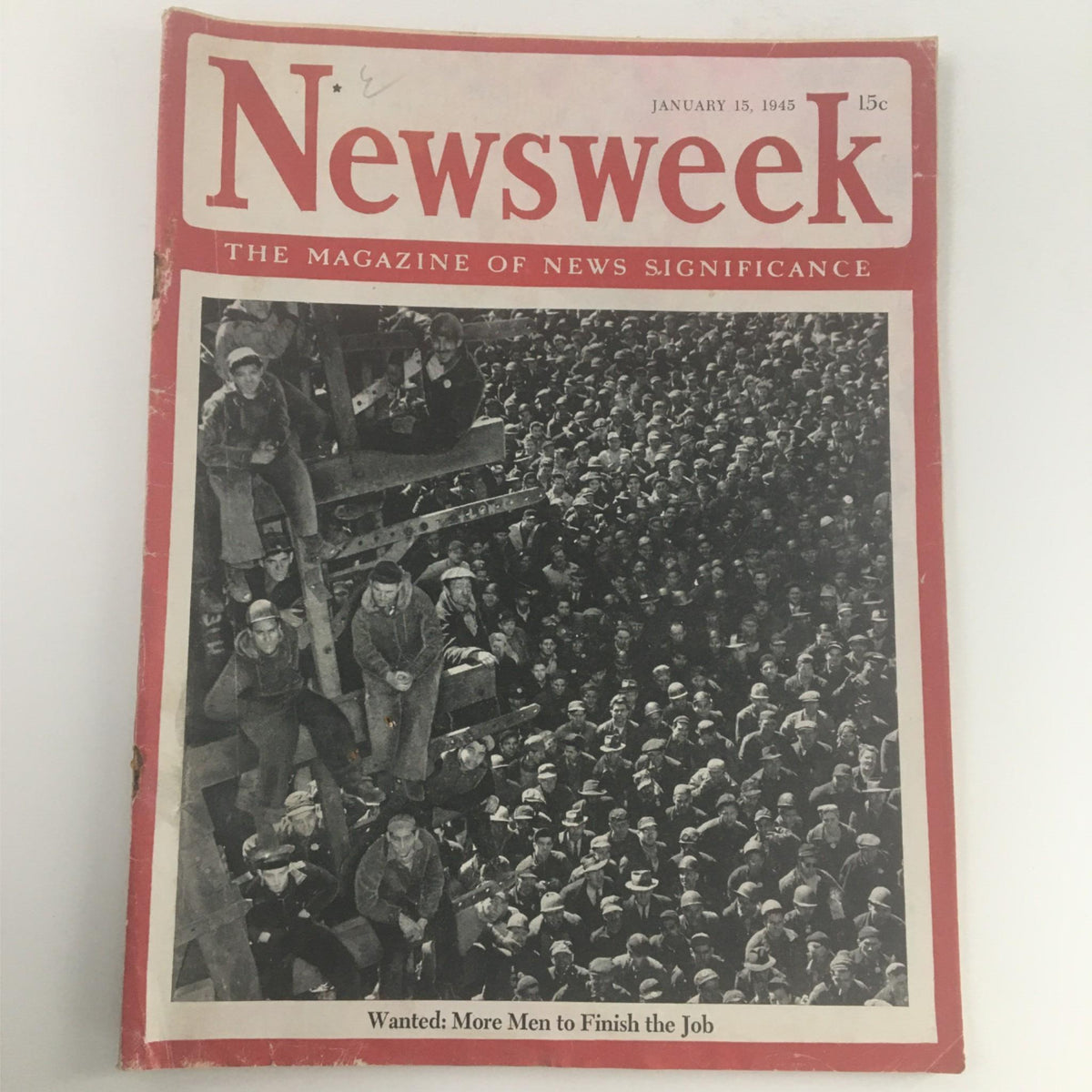 Cover of Newsweek Magazine from January 15, 1945, featuring the title 'Wanted: More Men To Finish The Job,' showcasing a crowd of men during World War II.