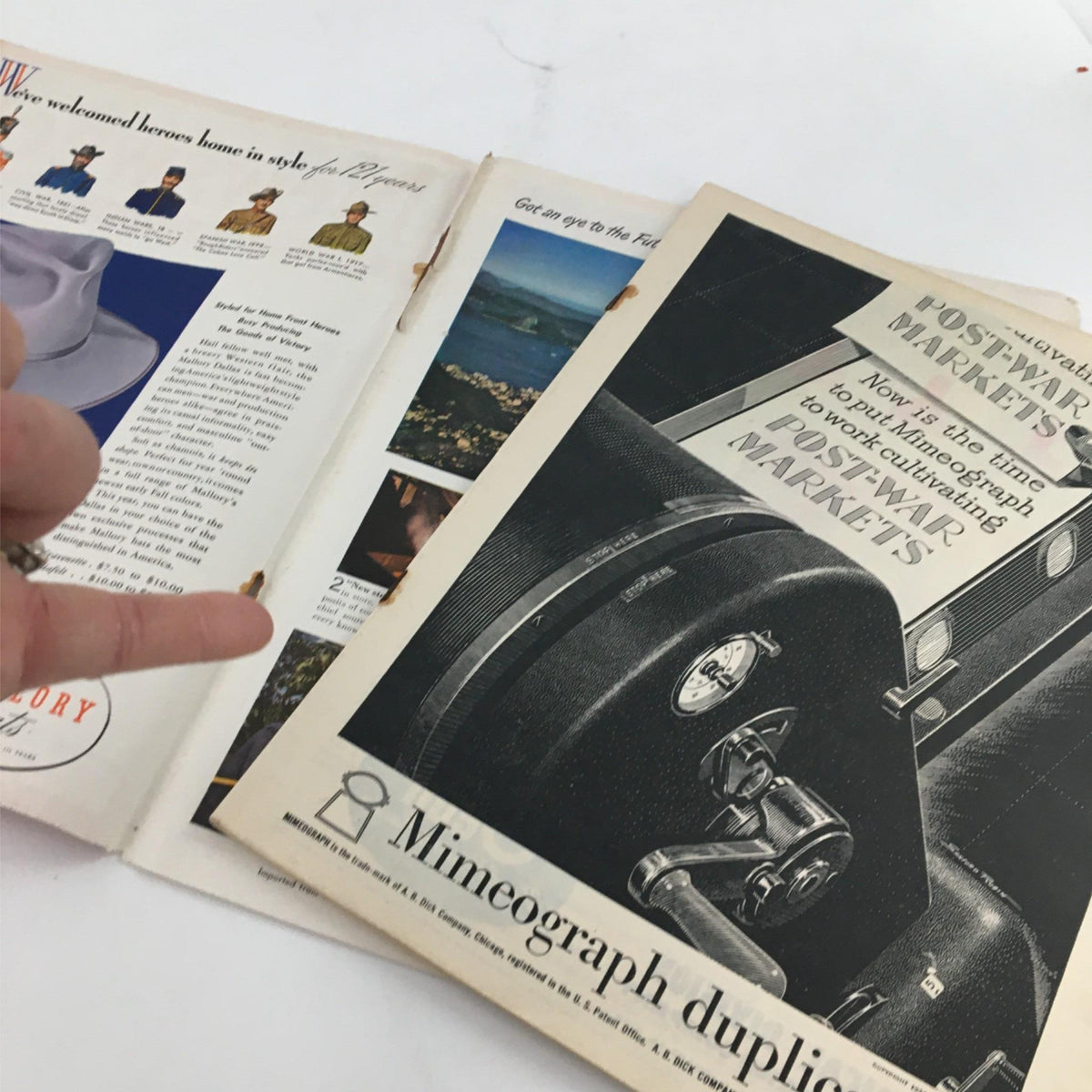 Interior page of Newsweek Magazine from September 18, 1944, displaying various advertisements including a mimeograph advertisement, reflecting post-war market trends.