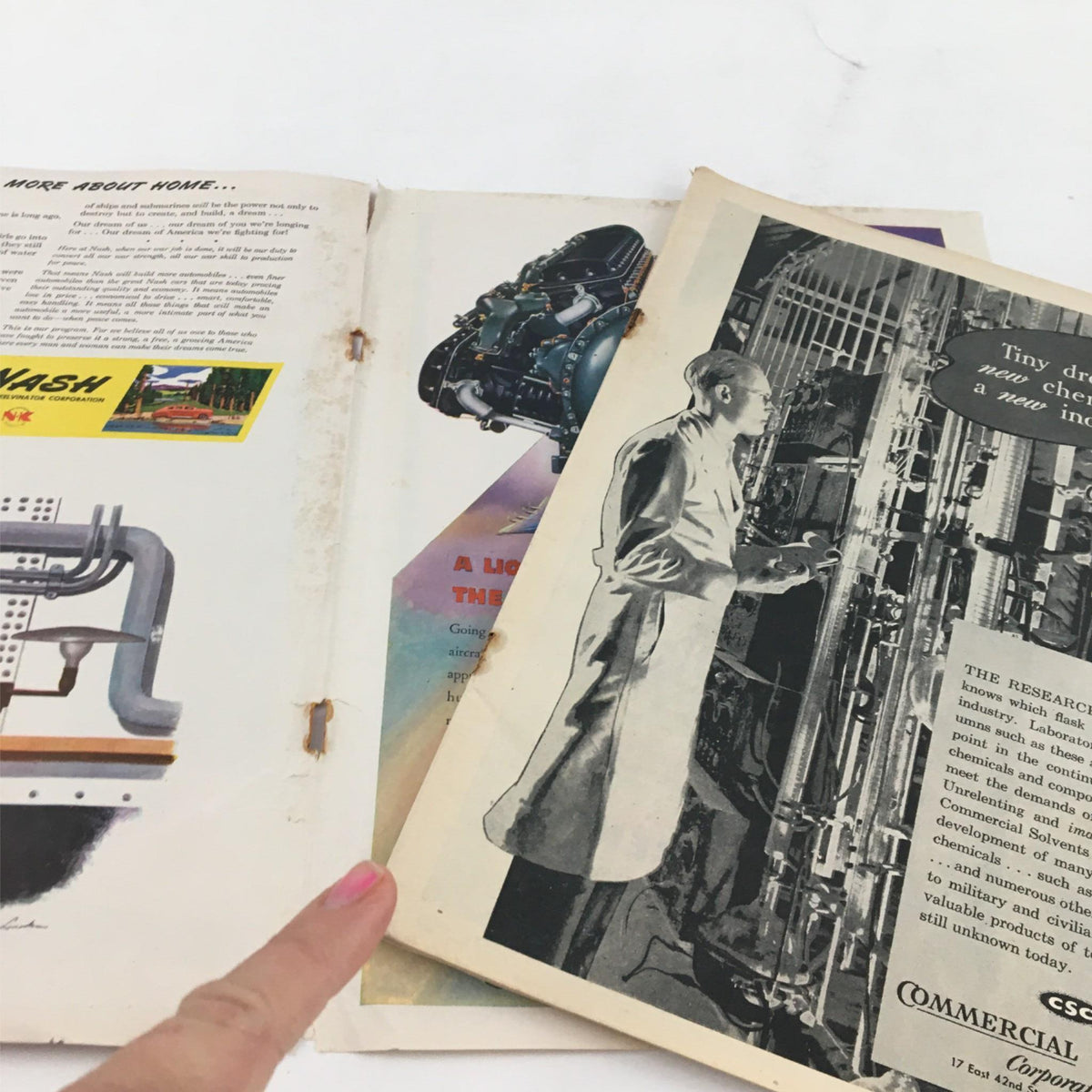 Inside view of the October 30, 1944 Newsweek Magazine displaying old advertisements and articles, highlighting its vintage condition and collectible nature.