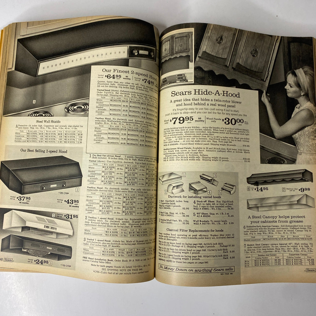1969 Sears Spring Through Summer Catalog displaying kitchen appliances including steel wall hoods and accessories with detailed descriptions and prices.