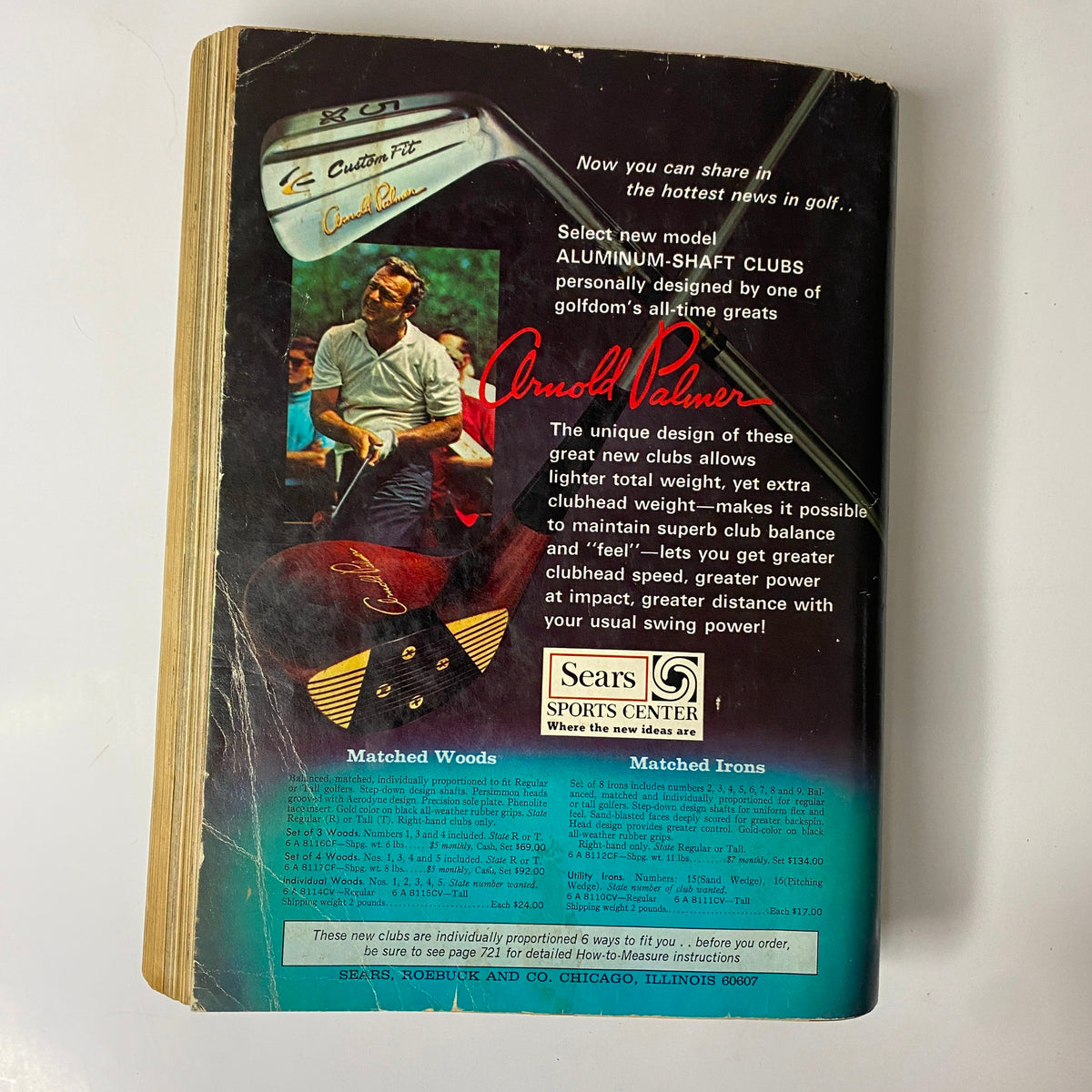 Back cover of the 1969 Sears Spring Through Summer Catalog advertising Arnold Palmer's aluminum-shaft golf clubs with a promotional description and image.