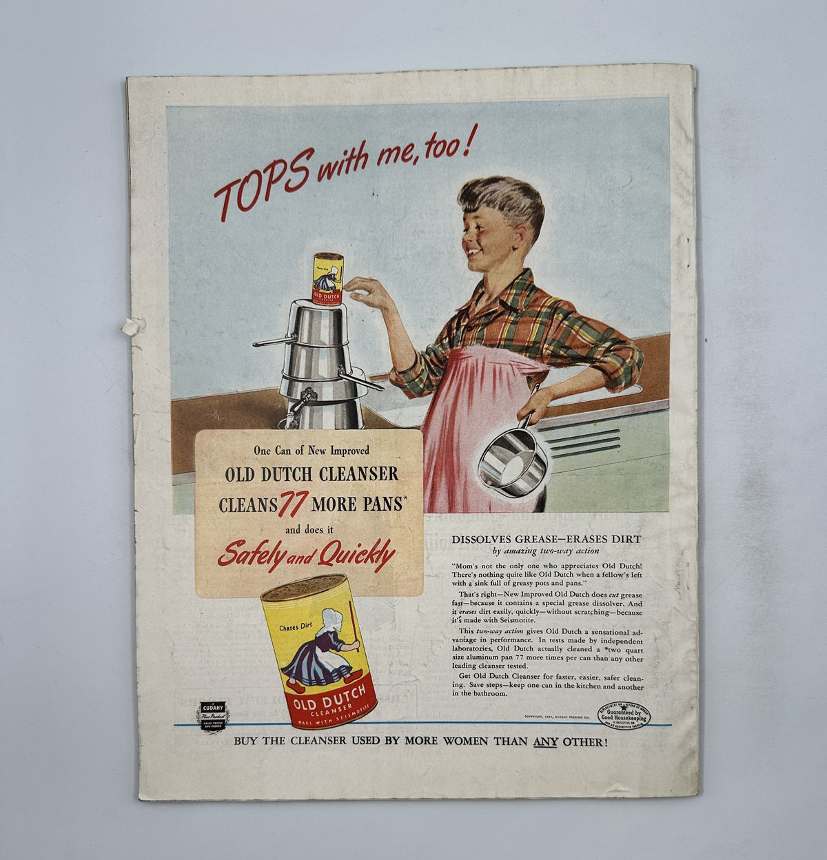 Back advertisement from Woman’s Home Companion Magazine September 1944 promoting Old Dutch Cleanser with a boy demonstrating its use.