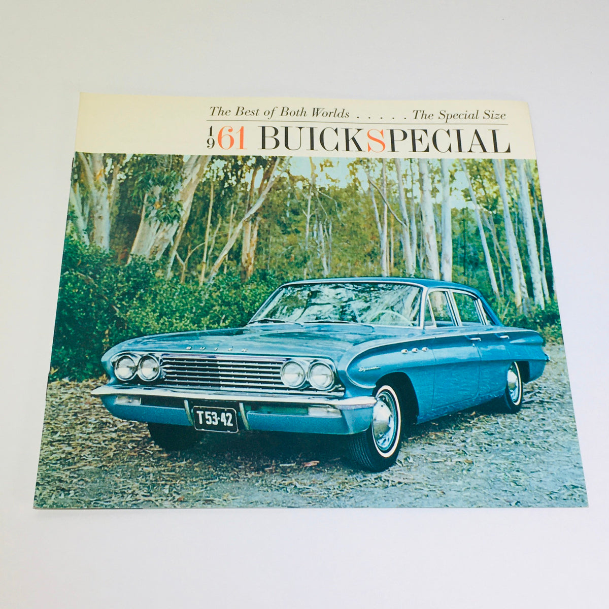 Vintage 1961 Buick Special Deluxe Sedan Station Wagon catalog brochure featuring a stylish exterior view of the car, showcasing its classic design and distinctive features.