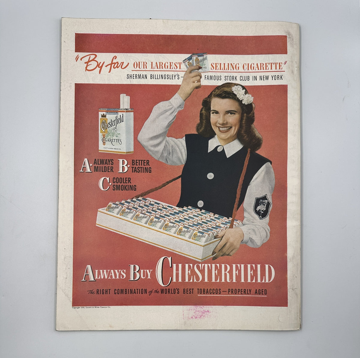 Back cover of the Woman's Home Companion Magazine July 1946 featuring an advertisement for Chesterfield cigarettes, promoting their product with a female model.