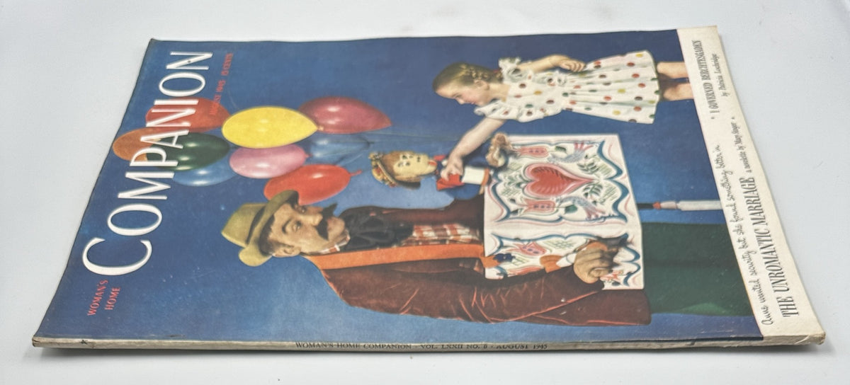 Another angle of the Woman's Home Companion Magazine August 1945 cover, showcasing the clown, balloons, and the title 'The Unromantic Marriage'.