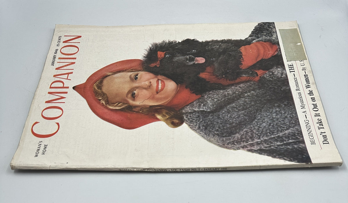 Another angle of Woman’s Home Companion Magazine January 1946 cover depicting the same woman in a bright hat and coat with her poodle, showcasing the title 'Don’t Take It Out on Women'.