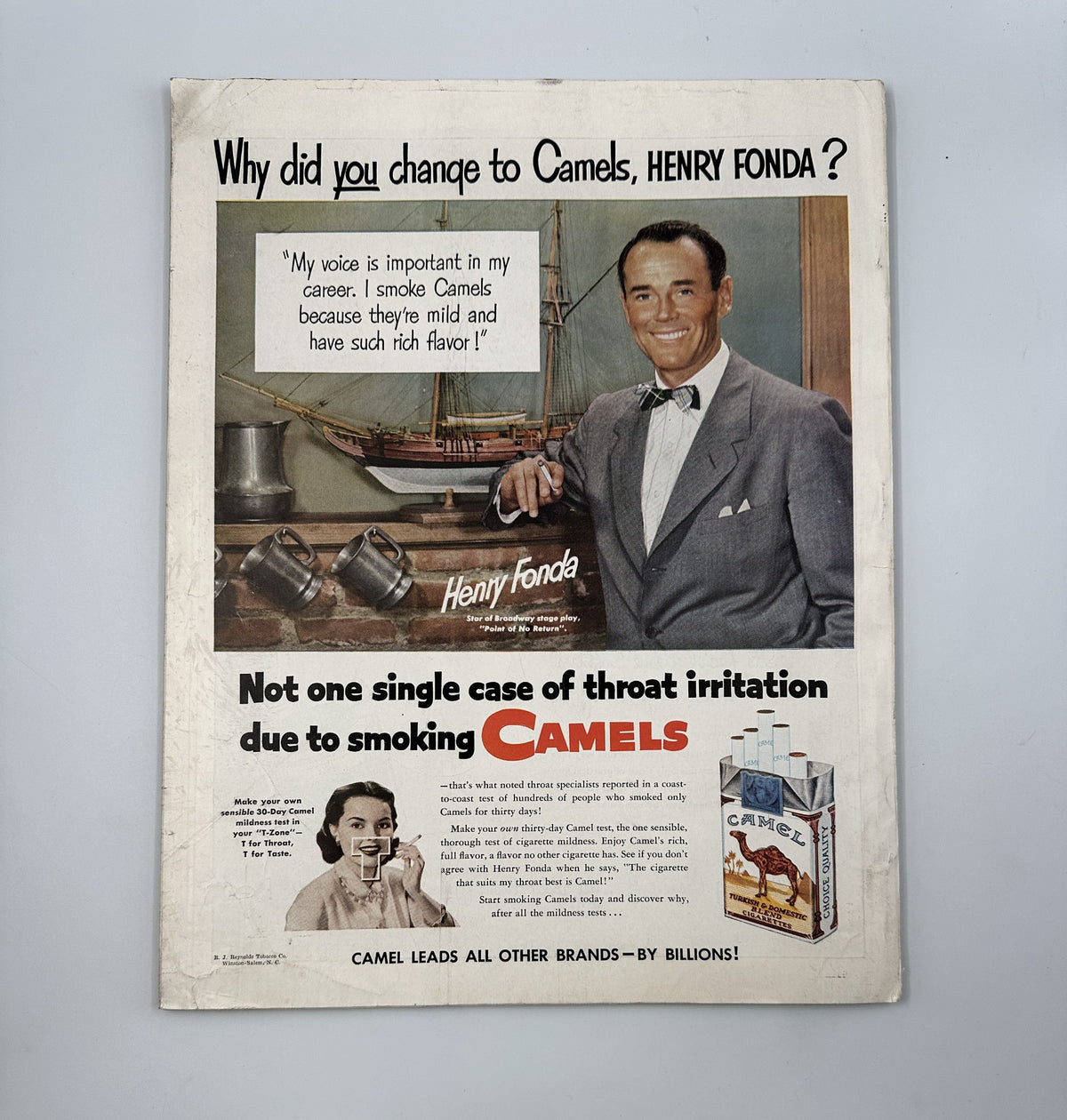 Cover page of Woman’s Home Companion Magazine, January 1952, showcasing an advertisement featuring Henry Fonda promoting Camels cigarettes, emphasizing the lack of throat irritation from smoking.