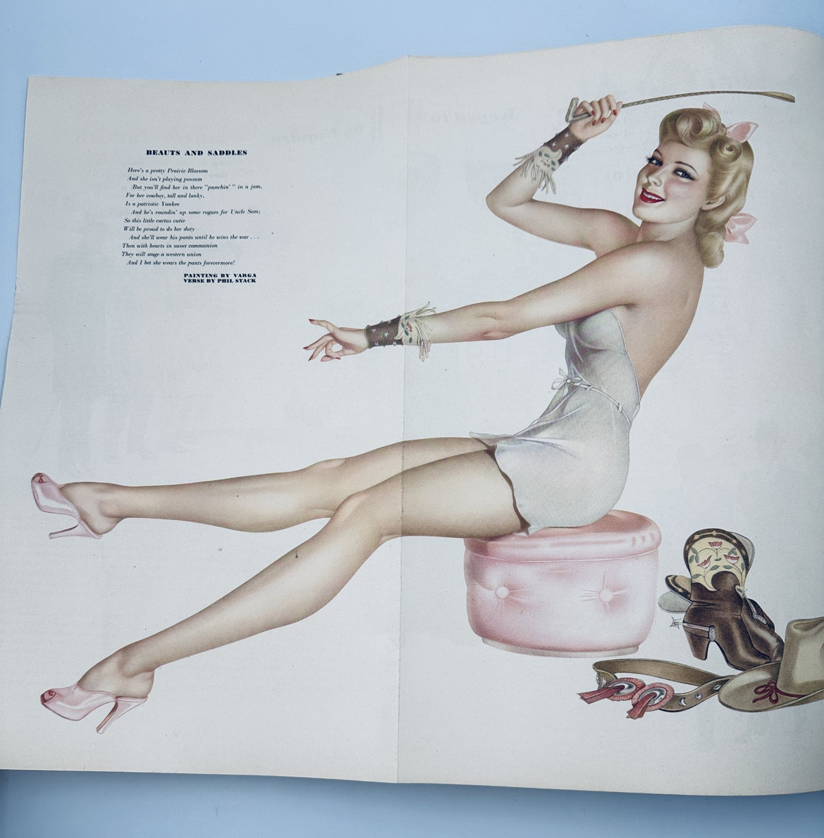 Pinup artwork from Esquire Magazine November 1942, depicting a glamorous woman in vintage fashion, emphasizing classic beauty and style.