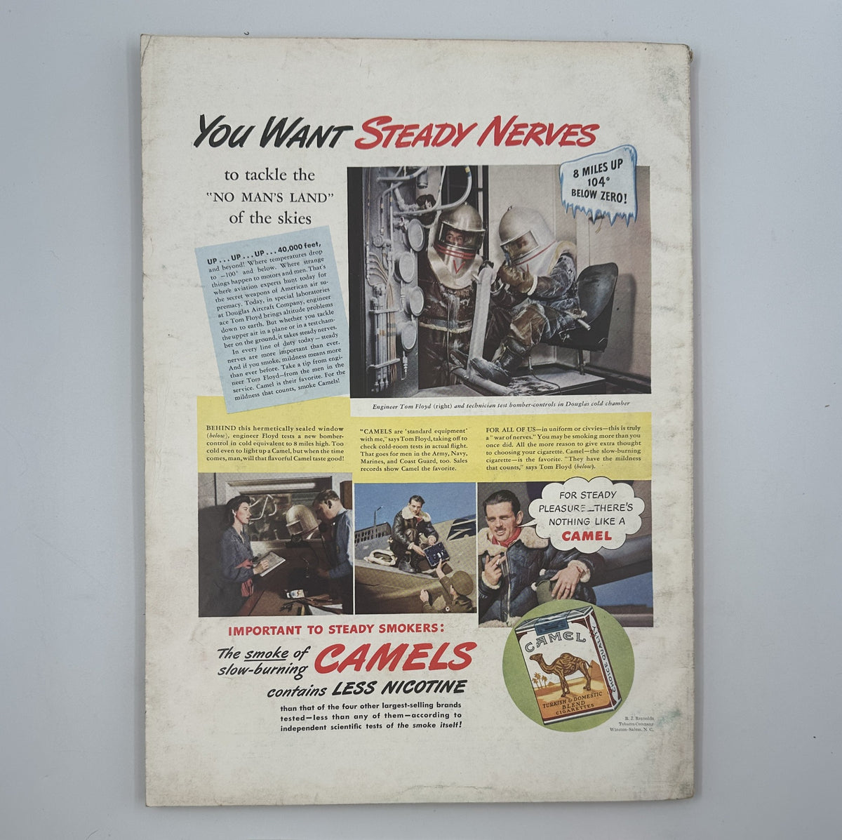 Back cover of Esquire Magazine August 1942 Victory Issue featuring an advertisement for Camels cigarettes, with a catchy slogan 'You Want Steady Nerves' and imagery of a pilot in a cockpit.