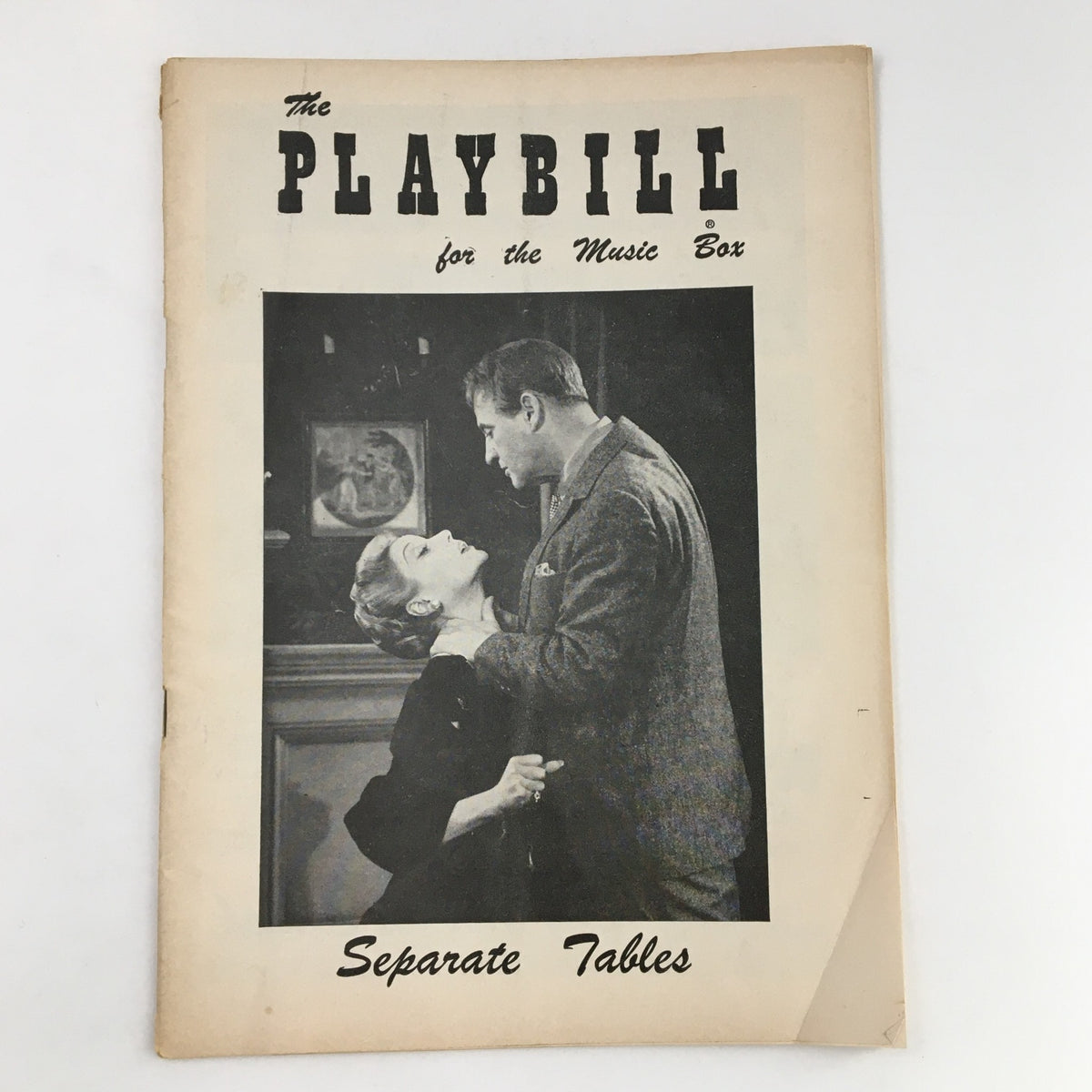 1956 Playbill for The Music Box featuring Separate Tables, a theatrical production by Terence Rattigan, showcasing a black and white image of two characters in a dramatic pose.