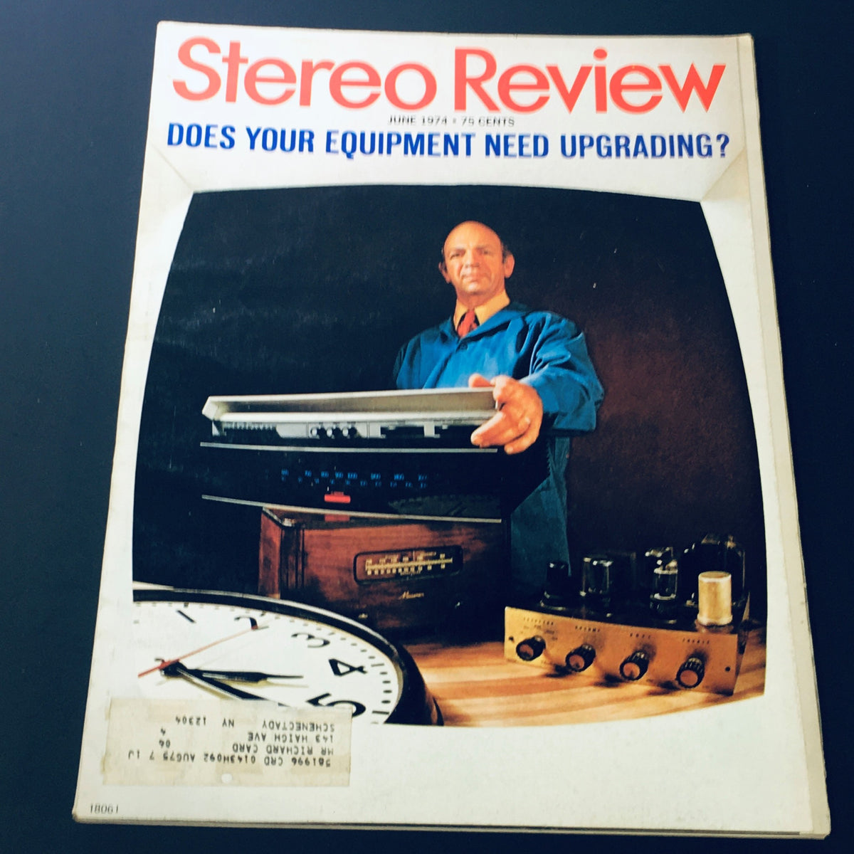 Cover of the June 1974 issue of Stereo Review Magazine, titled 'Does Your Equipment Need Upgrading?', featuring a man in a blue shirt presenting audio equipment, including a turntable and amplifier, against a dark background, highlighting vintage audio culture.