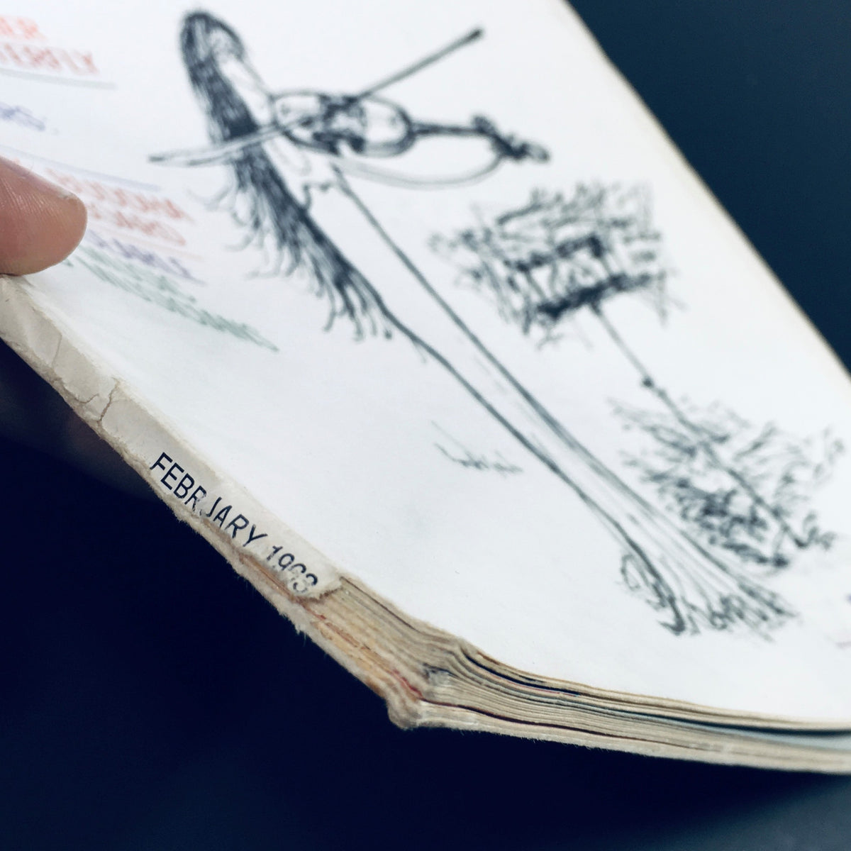 Close-up view of the spine of the VTG HiFi Stereo Review Magazine February 1963 showcasing the date and unique artistic illustration.