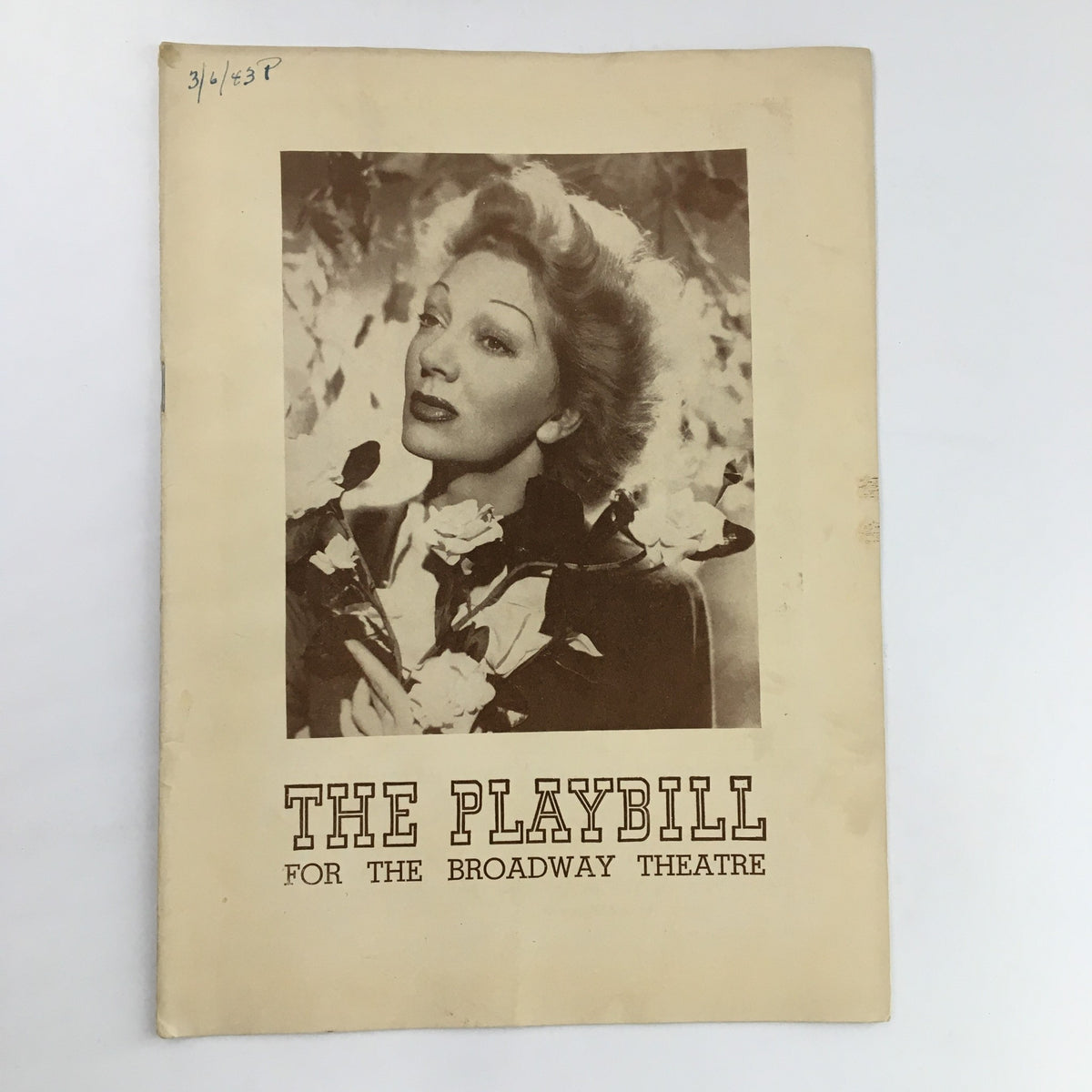 1943 Playbill for The Broadway Theatre, featuring a vintage cover image of a woman with flowers, promoting the production 'Lady In The Dark' presented by Sam H. Harris.
