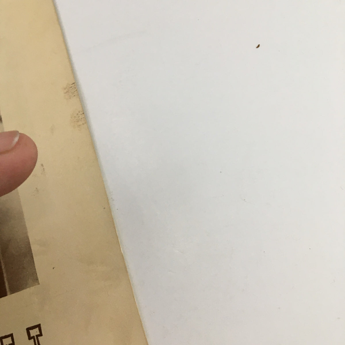 Side view of the 1943 Playbill for 'Lady In The Dark', showing a finger pointing at the edge of the cover with some signs of wear.