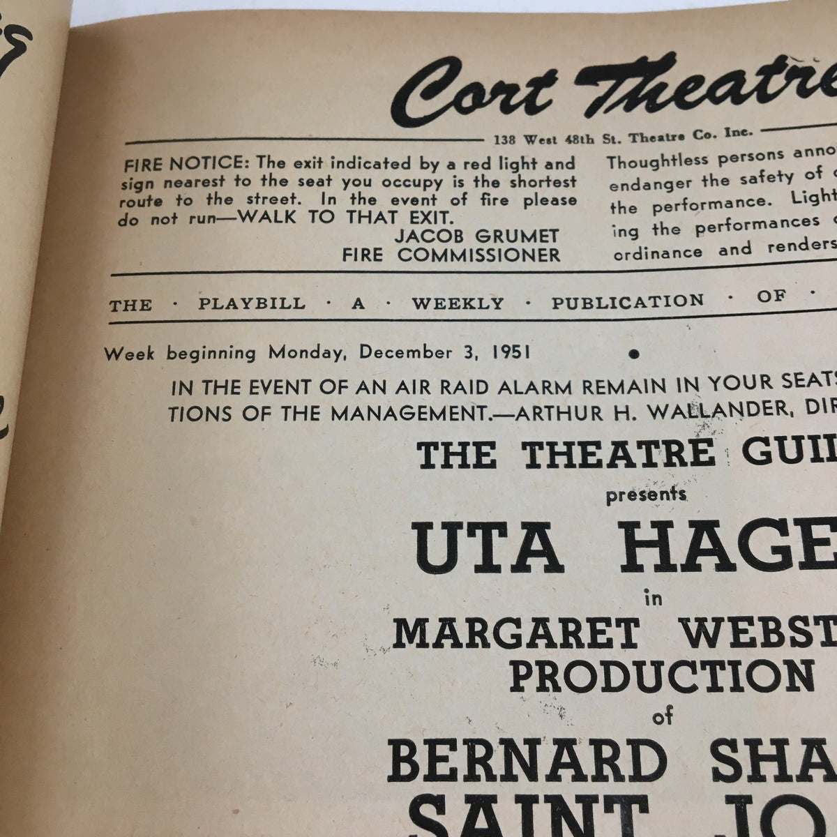 Close-up of the 1951 Playbill Cort Theatre, highlighting Uta Hagen's performance in Bernard Shaw's Saint Joan, showcasing vintage theater details.