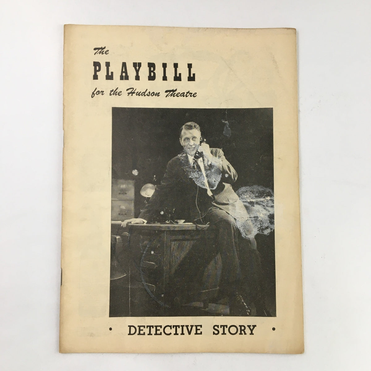1949 Playbill for the Hudson Theatre featuring Detective Story by Sidney Kingsley, showcasing a vintage design with a black-and-white photograph of an actor.