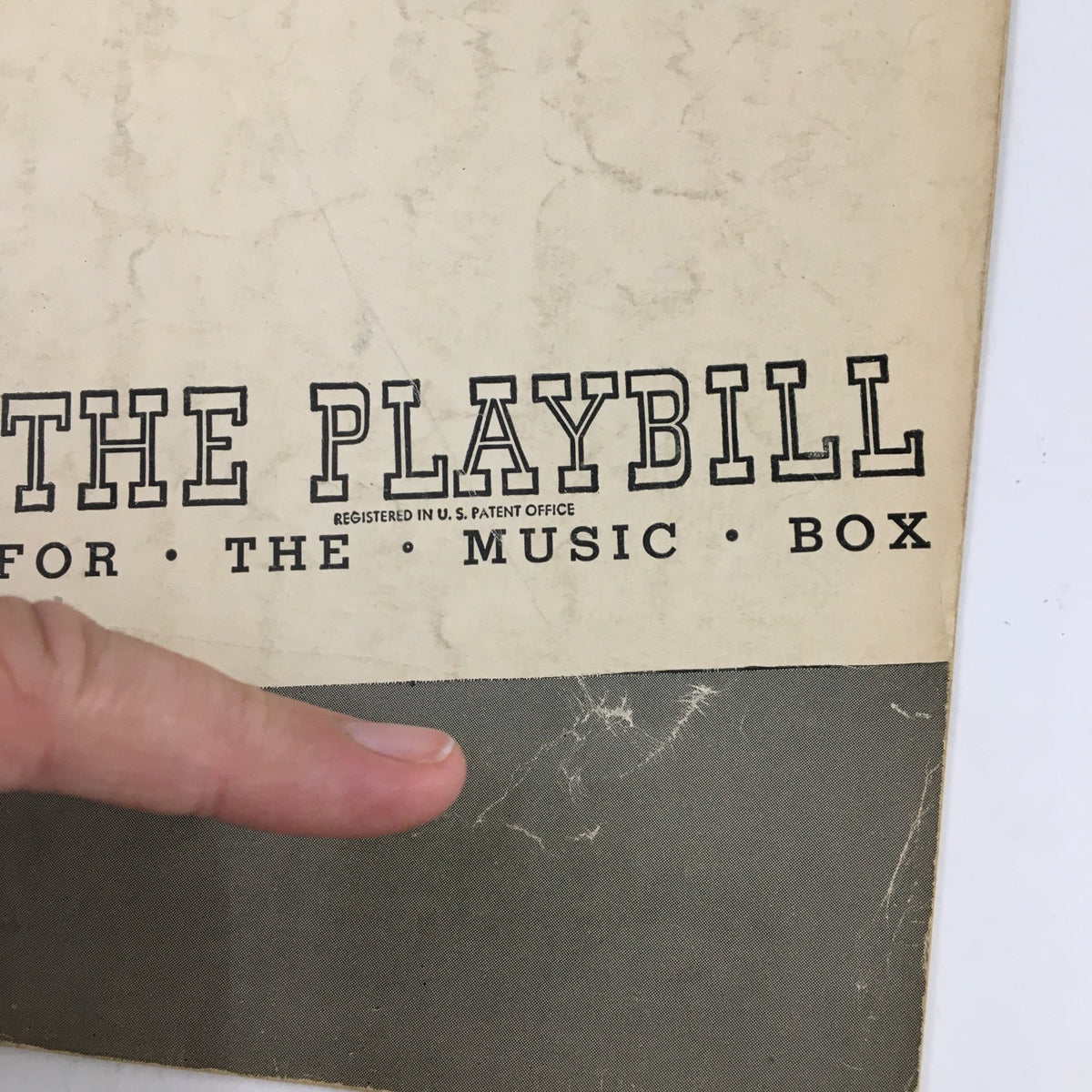 Close-up view of the 1948 Playbill The Music Box T. Edward Hambleton Present Ballet Ballads focusing on the title section 'The Playbill for The Music Box'.