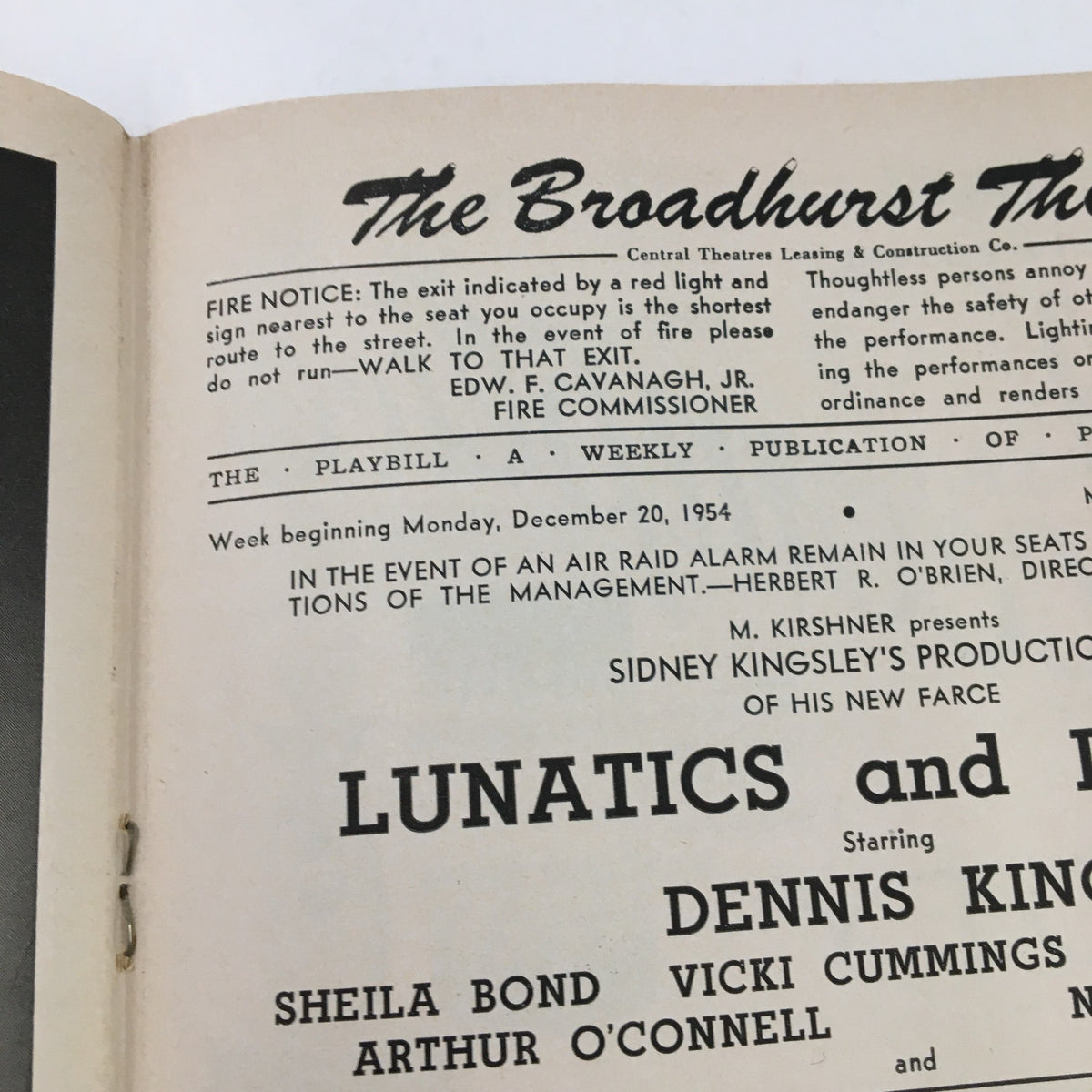Close-up of the interior information from the 1954 Playbill for The Broadhurst Theatre, announcing the production 'Lunatics and Lovers' with details on the cast and crew.