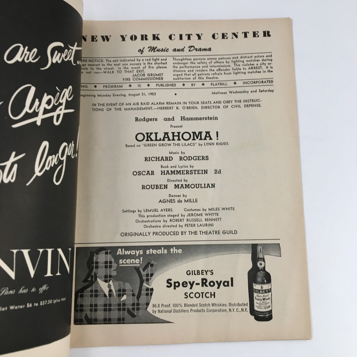 Inside page of the 1953 Playbill for 'Oklahoma!', listing the production details and credits for Rodgers & Hammerstein's presentation at New York City Center.