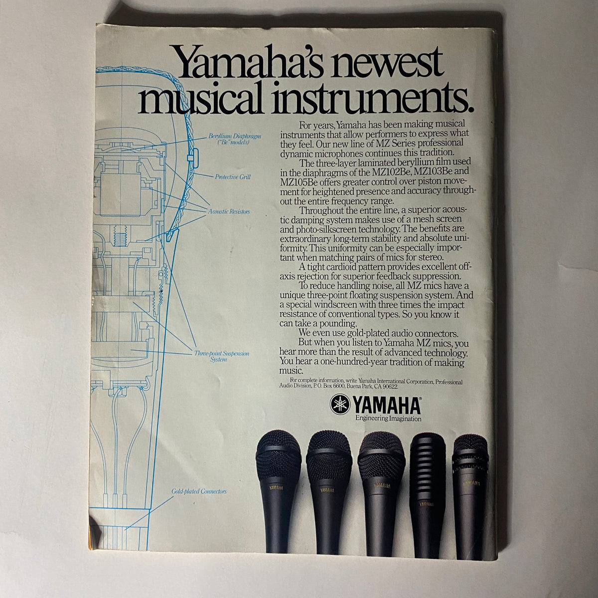 Vintage Musician Magazine August 1987 featuring an advertisement for Yamaha's newest musical instruments, showcasing a detailed microphone design and technical specifications.