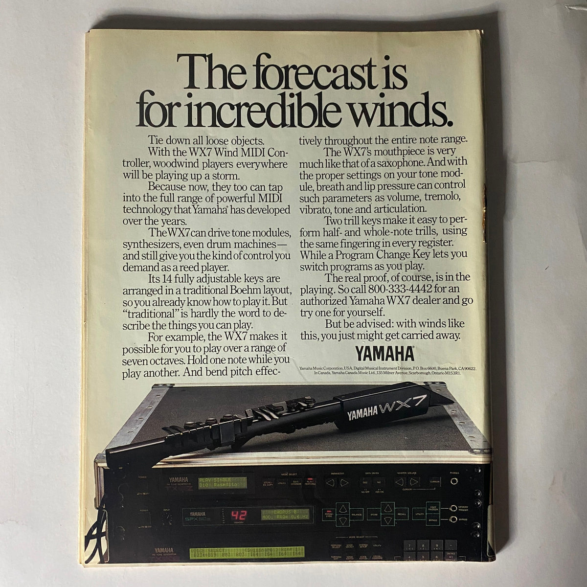 Vintage advertisement for the Yamaha WX7 Wind MIDI Controller from Musician Magazine December 1988 featuring text about its features like adjustable keys and control for synthesizers, with an illustration of the WX7 and MIDI modules.