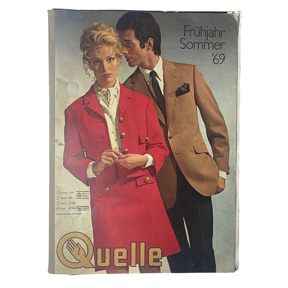 1969 Quelle Summer Catalog cover showcasing a stylish couple in a red jacket and a tan suit, reflecting late 1960s fashion trends.