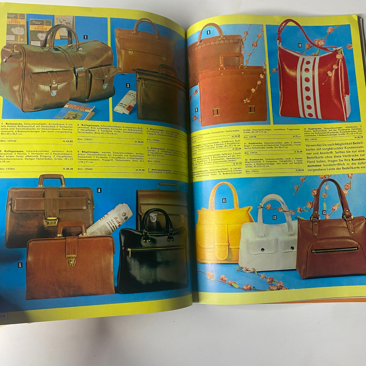 1975 Konsument Summer Catalog displaying an array of leather handbags and briefcases, highlighting fashionable and practical accessories from East Germany.