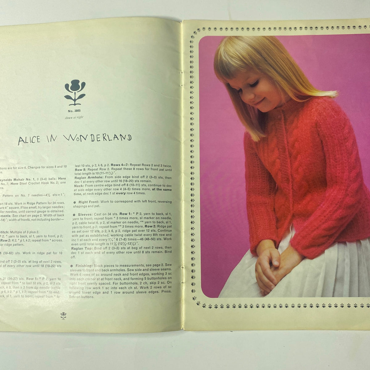 Another page from the 1980s Reynolds Designer Fashions for Children Catalog displaying a girl in a red cardigan titled 'ALICE IN WONDERLAND,' highlighting vintage children's knitwear.