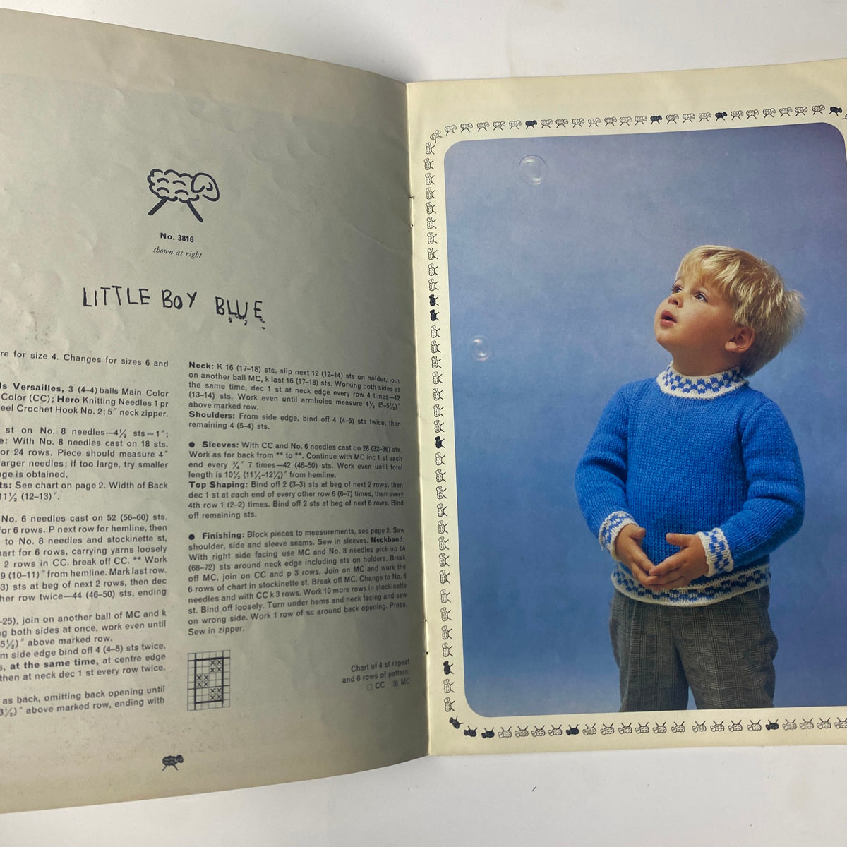 1980s Reynolds Designer Fashions for Children Catalog showcasing a boy in a blue Fair Isle sweater with light-colored pants, titled 'Little Boy Blue'.
