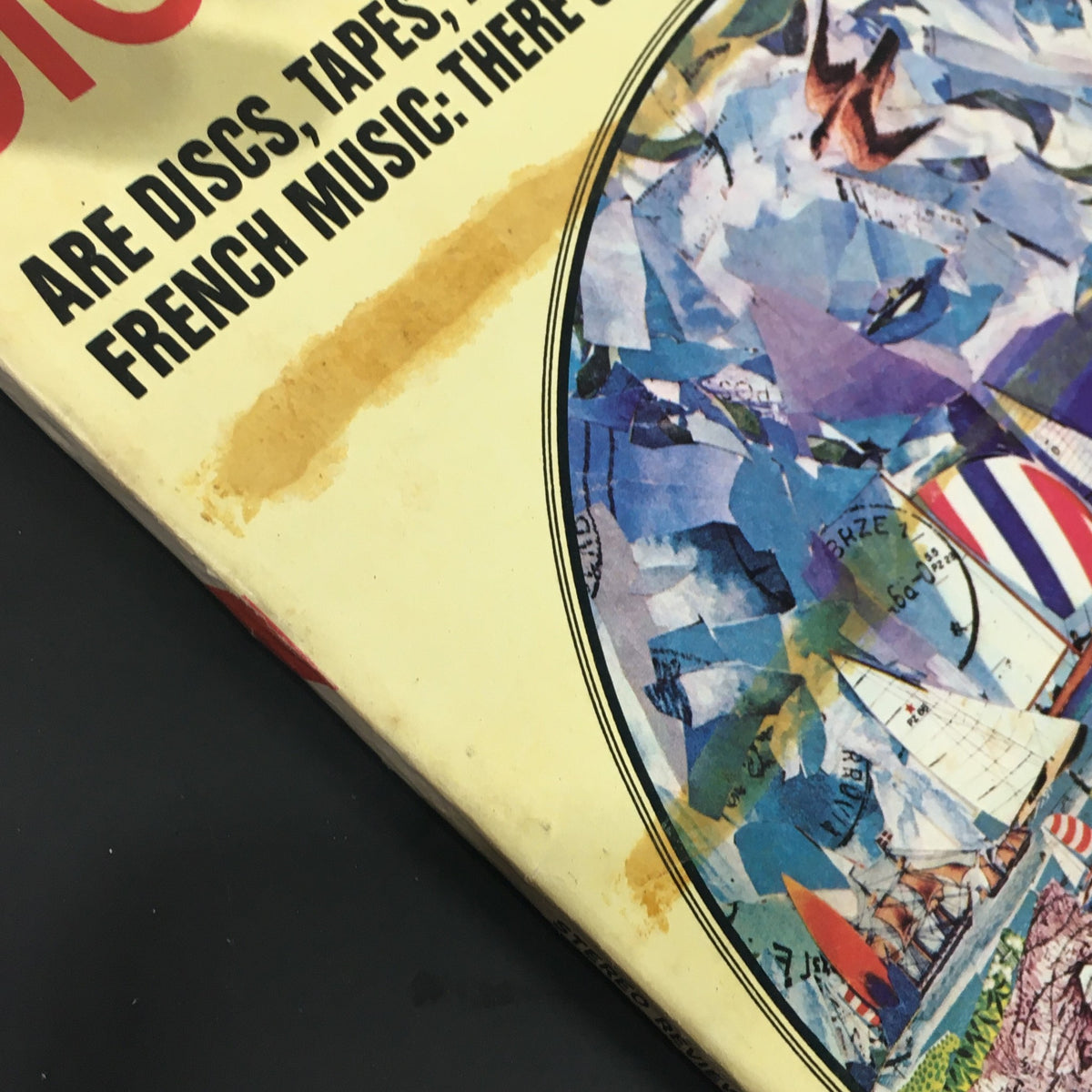 Detailed view of the cover of VTG Stereo Review Magazine February 1974 showing discoloration and wear, highlighting the magazine's age and history.